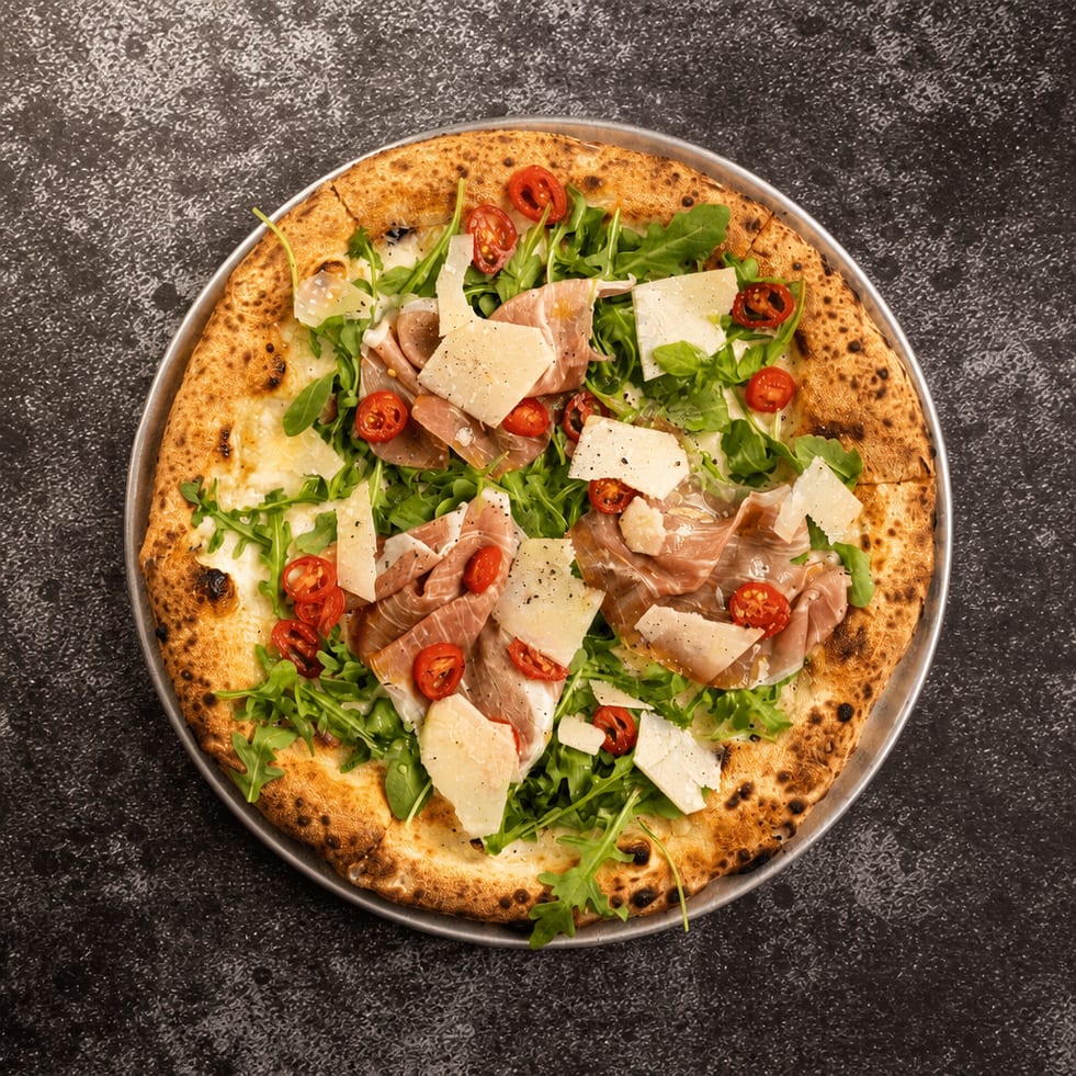 Prosciutto Arugula Pizza.
